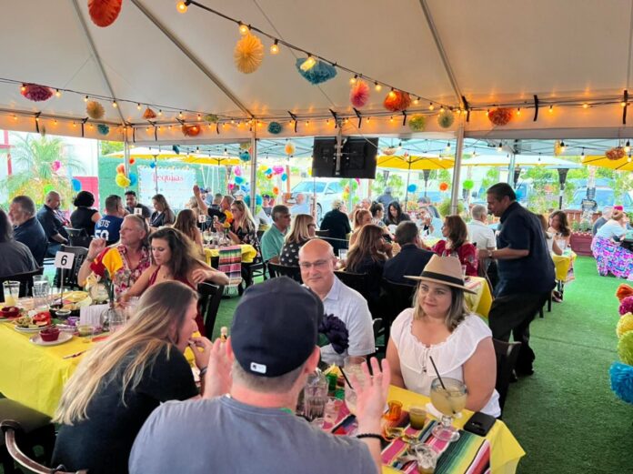 Soak Up the Sun on Our Vibrant Magnolia Park Patio